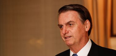 Presidente da República Jair Bolsonaro durante jantar com formadores de opinião, em Washington (EUA)