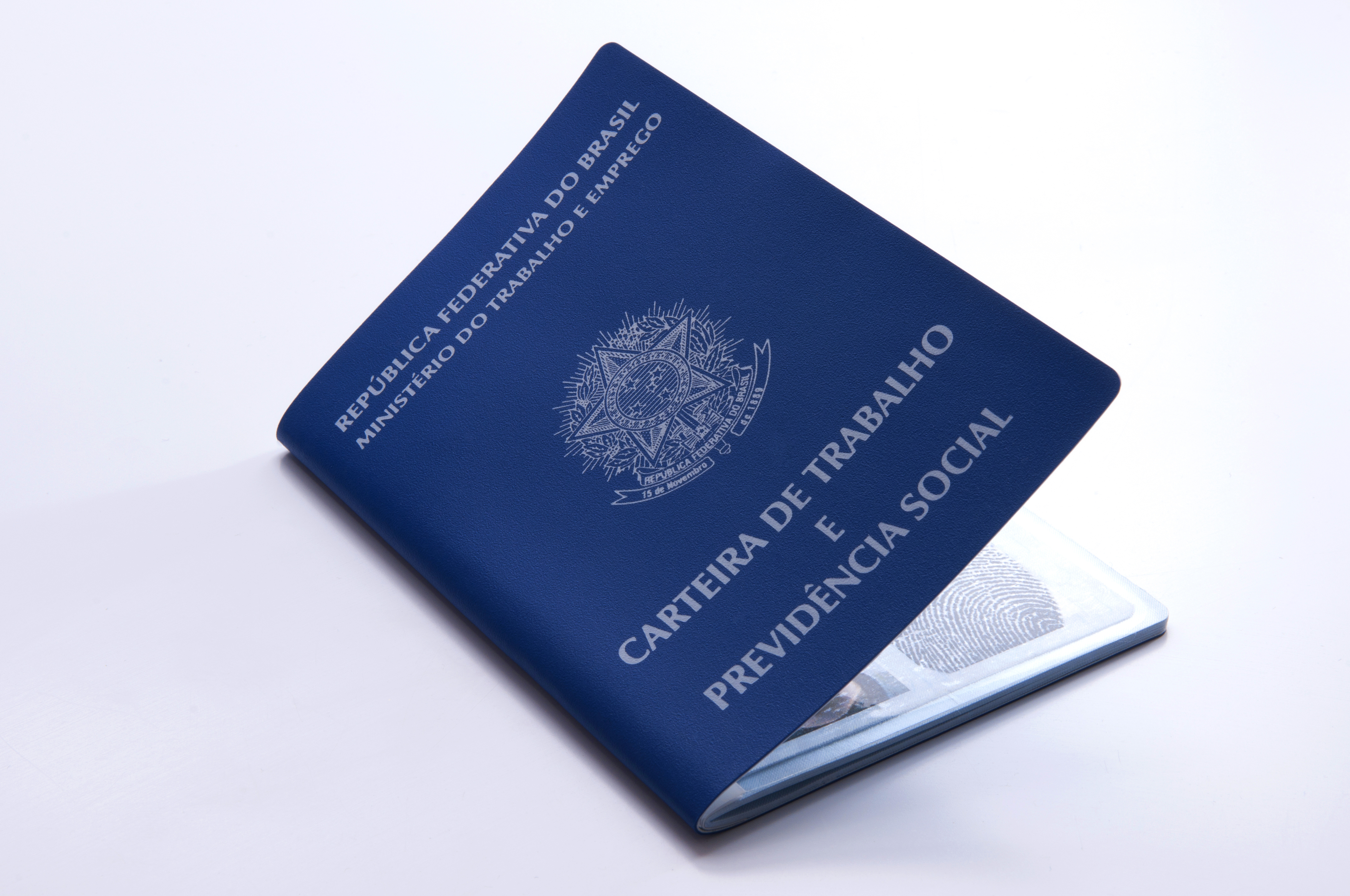 Brazilian work document and social security document (carteira de trabalho) on white background