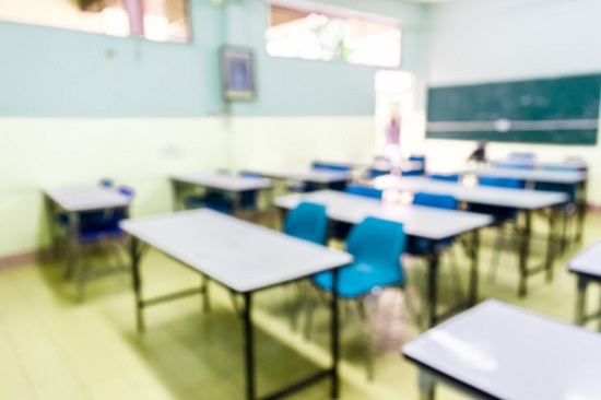 Blur image of empty classroom.